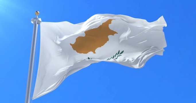 Cyprus flag waving at wind with blue sky, loop
