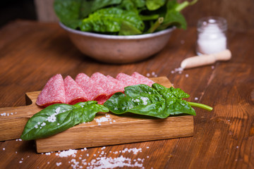 sausage with fresh spinach