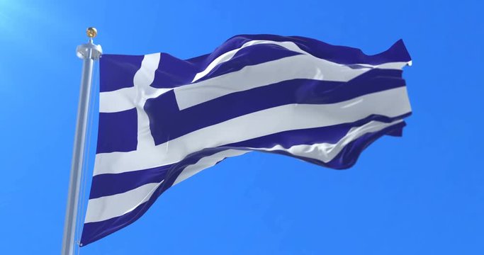 Flag of Greece waving at wind with blue sky, loop