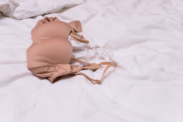 Fototapeta na wymiar the top bra on bed