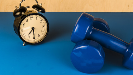 Dumbell rope and watch the concept of morning exercises
