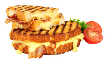 Brie cheese and pancetta meat toasted sandwich isolated on a white background