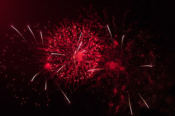 Bright fireworks in the night sky on a holiday