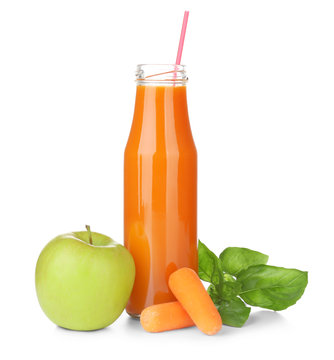Bottle of fresh juice and ingredients on white background