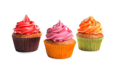 Tasty colorful cupcakes on white background