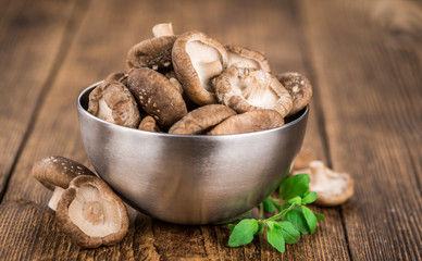 Portion of Raw Shiitake mushrooms, selective focus