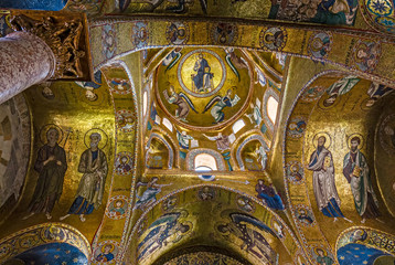 Fototapeta na wymiar The vault decorated with beautiful Byzantine mosaics in the Martorana church, Palermo in Sicily.