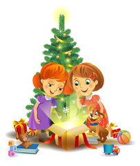 Fototapeta premium Christmas miracle - girls opening a magic gift beside a Christmas tree