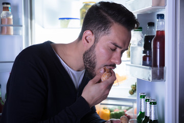 Close-up Of A Man Eating Cookie