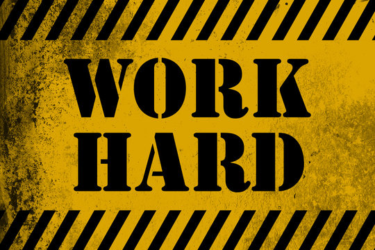 Work Hard sign yellow with stripes