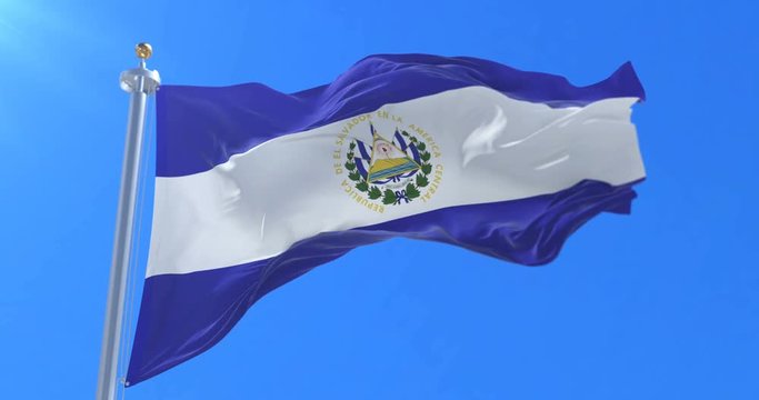 Flag of El Salvador waving at wind with blue sky, loop
