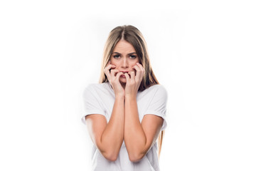 Fototapeta premium worried girl biting nails