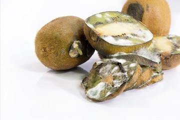 Rotten Kiwis isolated on white background