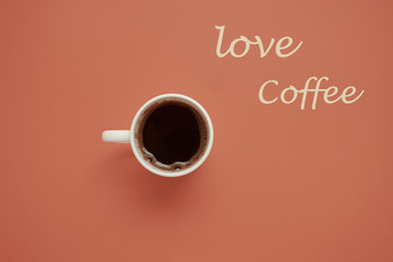 morning coffee cup on pastel background  top view