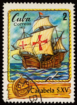 Ancient sailing ship - caravel on postage stamp