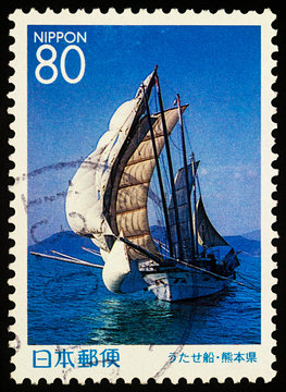 Japanese traditional fishing boat on postage stamp