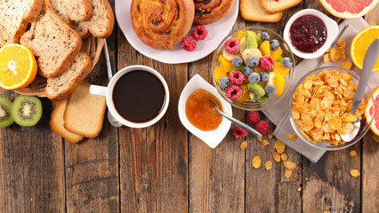 breakfast with coffee,croissant and fruit