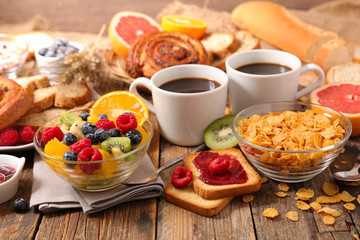 breakfast with coffee,croissant and fruit