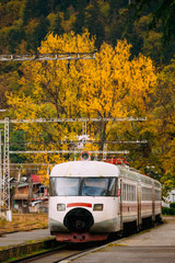 Fototapeta na wymiar Borjomi, Samtskhe-Javakheti, Georgia. Suburban Electric Train Near Borjomi Parki Railway Station