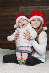  cute happy children with santa hats