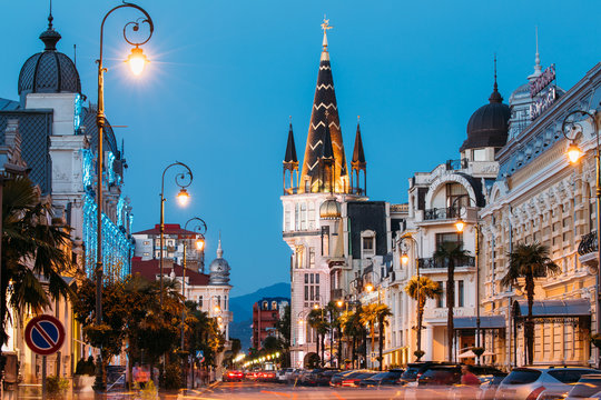 Batumi, Adjara, Georgia. Evening View On Former National Bank Building With Astronomical Clock