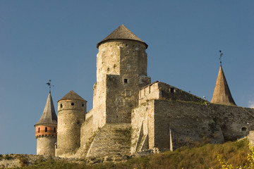 Fototapeta na wymiar Summer view to castle in Kamianets-Podilskyi