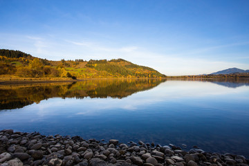 Fototapeta premium Reflection from the bank of lake