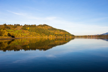 Hill reflection in water