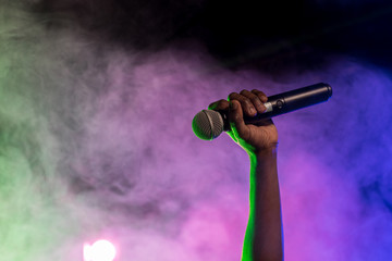 hand holding microphone