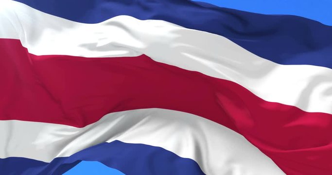 Flag of the Republic of Costa Rica waving at wind with blue sky, loop