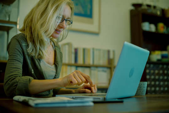 Woman using laptop computer