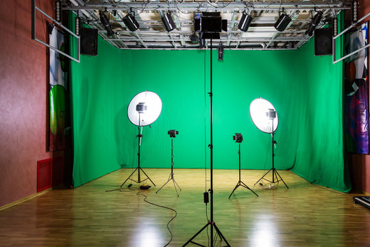 Studio for movies. Green screen. The chroma key. Lighting equipment in the pavilion. Show business