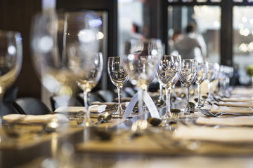Wineglasses arranged on dining table