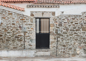 Fototapeta na wymiar Wall with door - Greek house