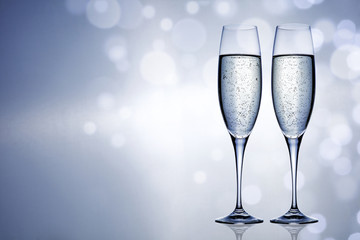 Silver sealed champagne on a background with space for advertising text 