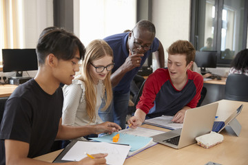 Design Students With Teacher Working In CAD/3D Printing Lab