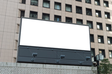 Large blank billboard on a street wall, banners with room to add your own text