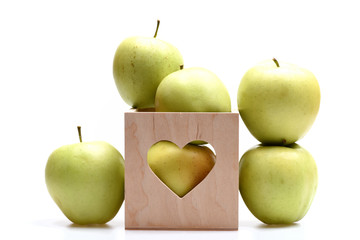 Set of fruit placed in wooden valentines box with heart