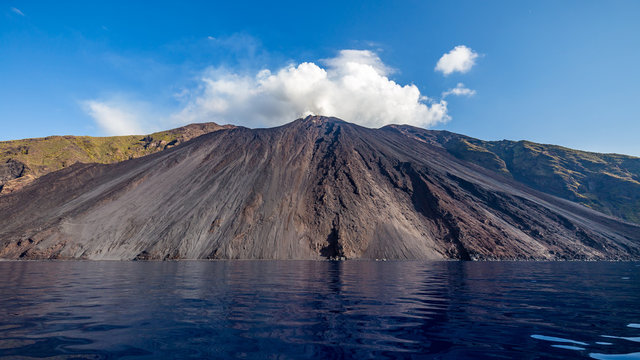 Wide angle view of the north side of active volcano Stromboli, Italy, with Sciara del Fuoco photographed from a boat.