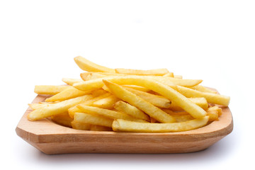 pile of french fries on wooden plate - isolated