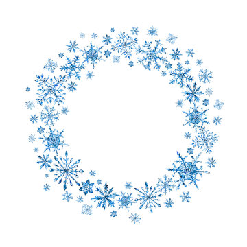 Watercolor winter wreath with snowflakes