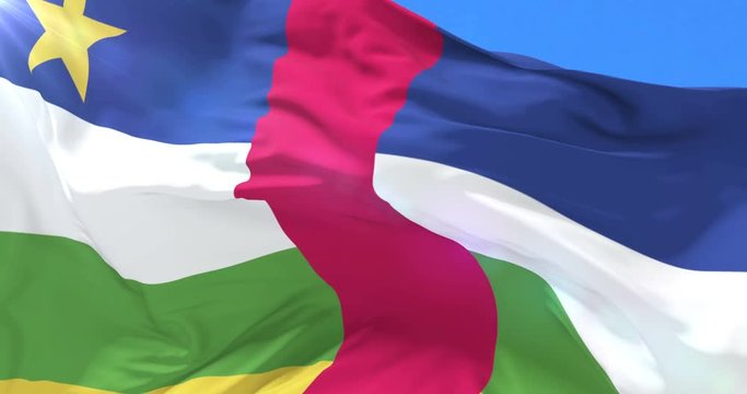 Flag of the Central Africa Republic waving at wind with blue sky, loop