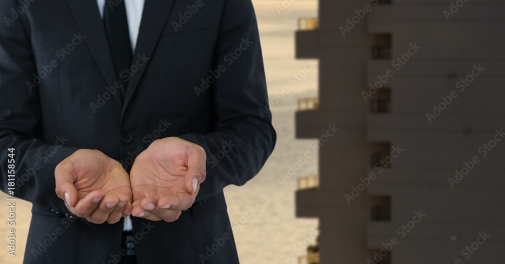 Canvas Prints Businessman with hands palm open in city