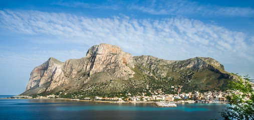 Fototapeta na wymiar Sicily coast, turquoiose water mountains in the back, Italy, europe