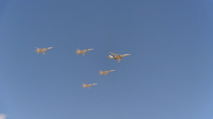 Bombers Tupolev Tu-160 (Blackjack) and Tu-22m3 fly in sky