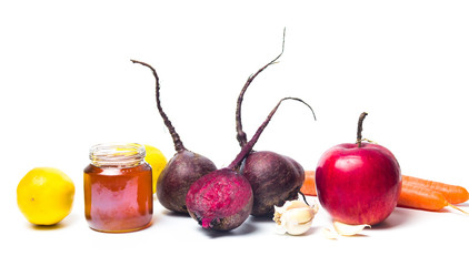 Raw beet with healthy fruits isolated on white