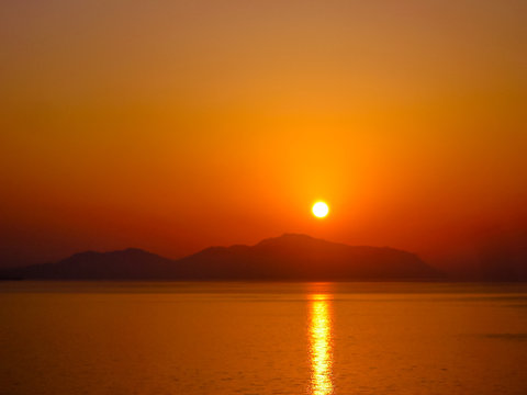 Sunset light on the Red Sea, at Sharm el Sheikh. Sinai Peninsula, Egypt. Copy space and orange color. Sunset background.