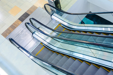 Empty Escalators Stairway Top View. Motion Blur Moving Staircase