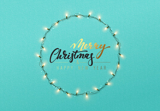 Glowing Christmas lights wreath for Xmas holiday greeting cards design