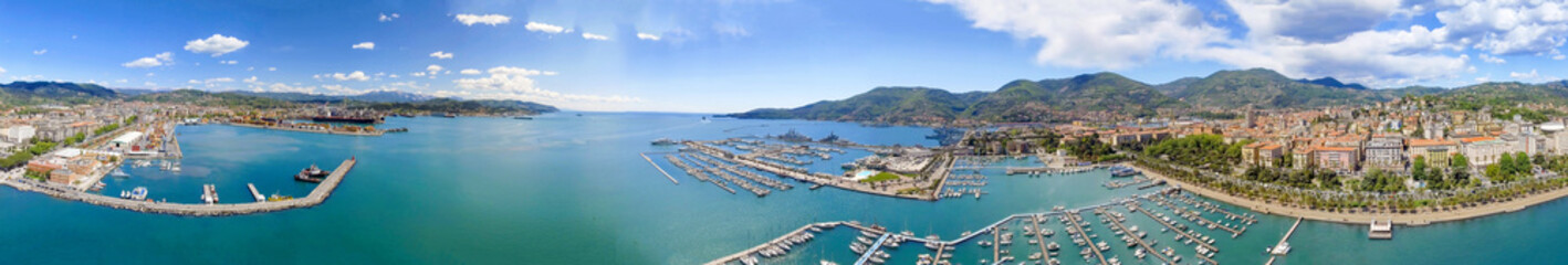 Fototapeta na wymiar La Spezia, Italy. Panoramic view of port and city skyline on a sunny day